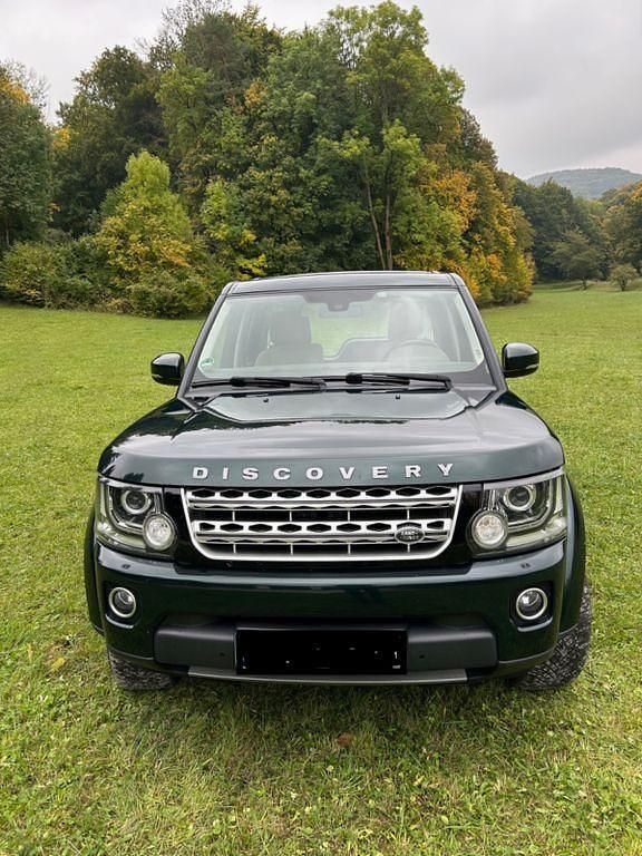 Grün Gebraucht 2015 Land Rover Discovery 4 HSE SUV | 33.333 € - Bild 1/4