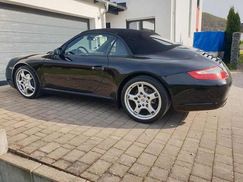 Schwarz Gebraucht 2006 Porsche 911 Carrera Cabriolet Cabrio | 42.900 € (Fairer Preis) - Bild 1/4