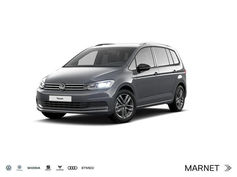 Grau Gebraucht 2024 VW Touran Move Van / Kleinbus | 31.489 € (Fairer Preis) - Bild 1/4