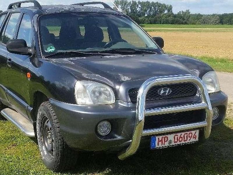 Gebraucht Hyundai Santa Fe GLS 145 PS (106 kW) 2002 Ebony black+cool gra SUV