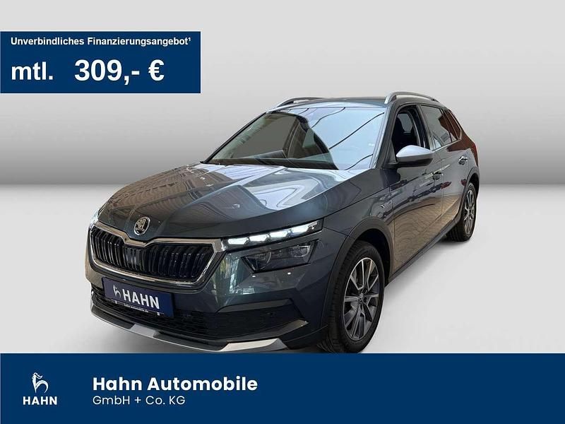 Quarzgrau metallic Gebraucht 2021 Skoda Kamiq ScoutLine SUV | 22.495 € (Fairer Preis) - Bild 1/3