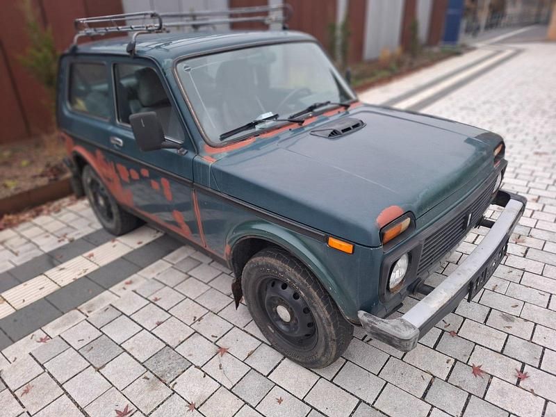 Grün Gebraucht 2006 Lada niva SUV | 1.399 € - Bild 1/4