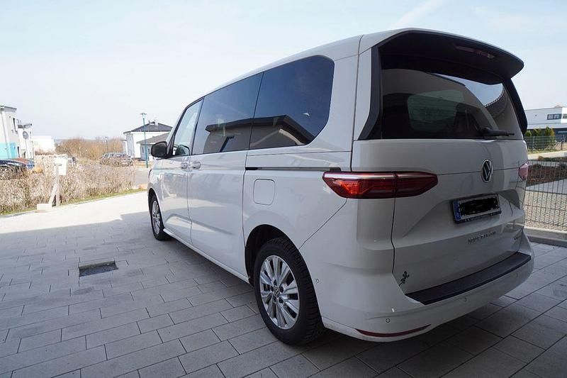 Second-hand VW Multivan 218 CP (160 kW) 2021 Alb Monovolum