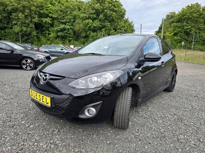 Schwarz Gebraucht 2013 Mazda 2 Inclusive Limousine | 4.890 € (Fairer Preis) - Bild 1/4