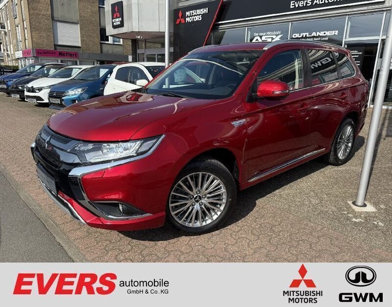 Dynamik rot (d) Gebraucht 2020 Mitsubishi Outlander P-HEV Basis Limousine | 18.450 € (Guter Preis) - Bild 1/4