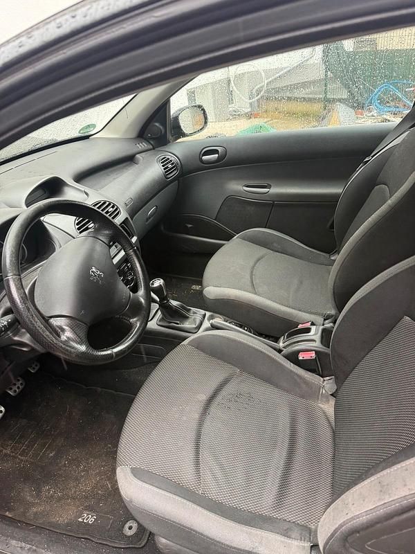 Gebraucht Peugeot 206 75 PS (55 kW) 2009 Schwarz Kleinwagen
