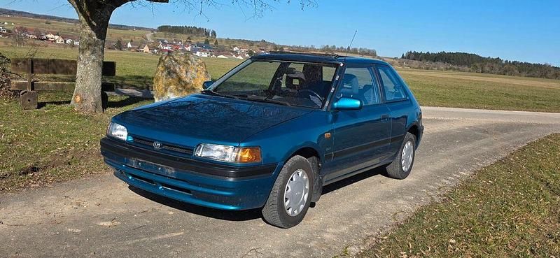 Gebraucht Mazda 323 88 PS (64 kW) 1993 Grün Kleinwagen