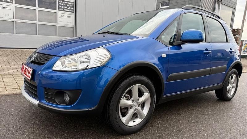 Blau Gebraucht 2009 Suzuki SX4 SUV | 7.800 € (Fairer Preis) - Bild 1/4