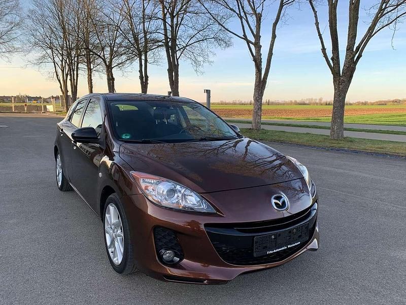 Gebraucht Mazda 3 Prime-Line 105 PS (77 kW) 2012 Autumn bronze mica Limousine
