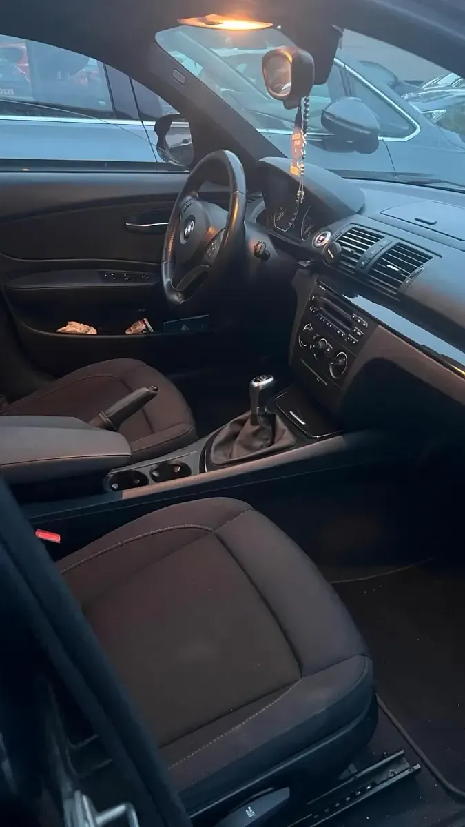 Gebraucht BMW 116 115 PS (84 kW) 2010 Schwarz Kleinwagen