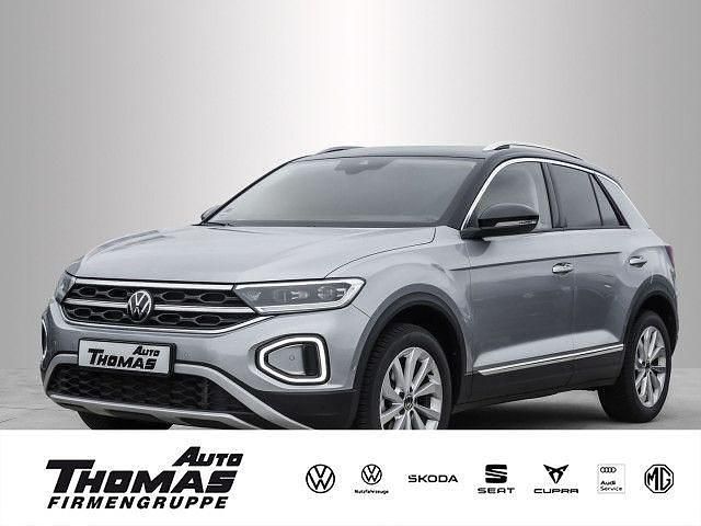 Pyritsilber metallic Gebraucht 2024 VW T-Roc Style SUV | 28.380 € (Guter Preis) - Bild 1/2