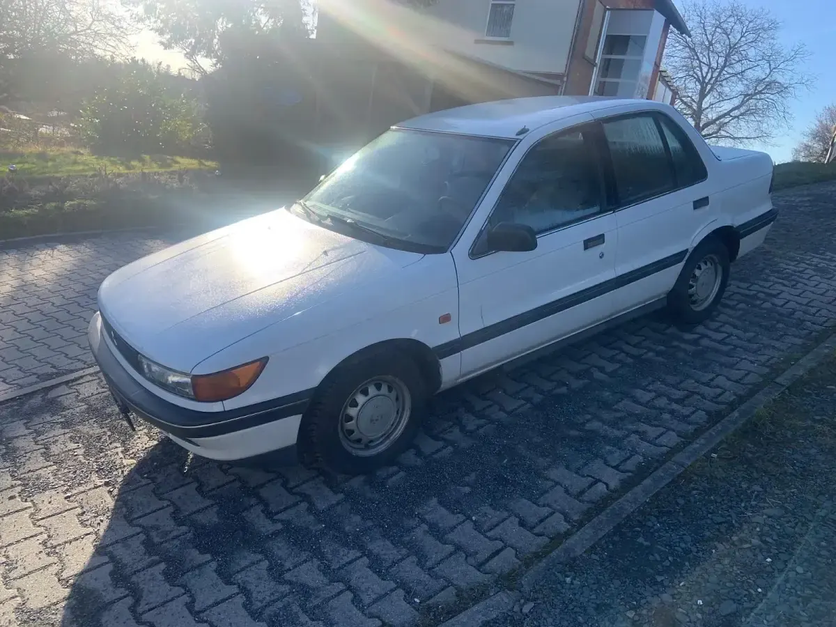 Gebraucht Mitsubishi Lancer 90 PS (66 kW) 1992 Weiß Limousine
