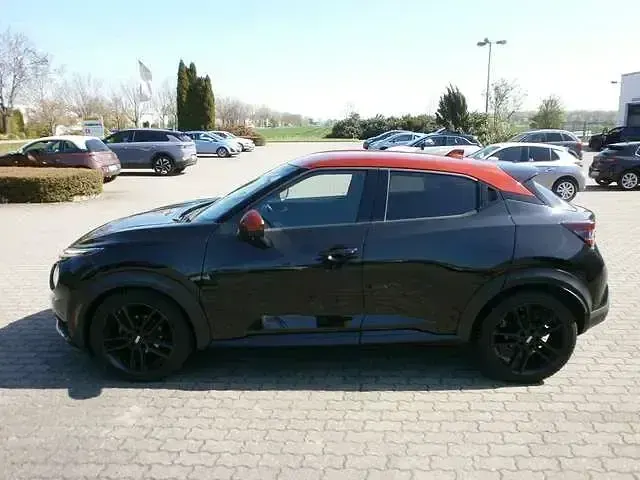 Gebraucht Nissan Juke Tekna 114 PS (83 kW) 2021 Black / sunset red (metallic) SUV