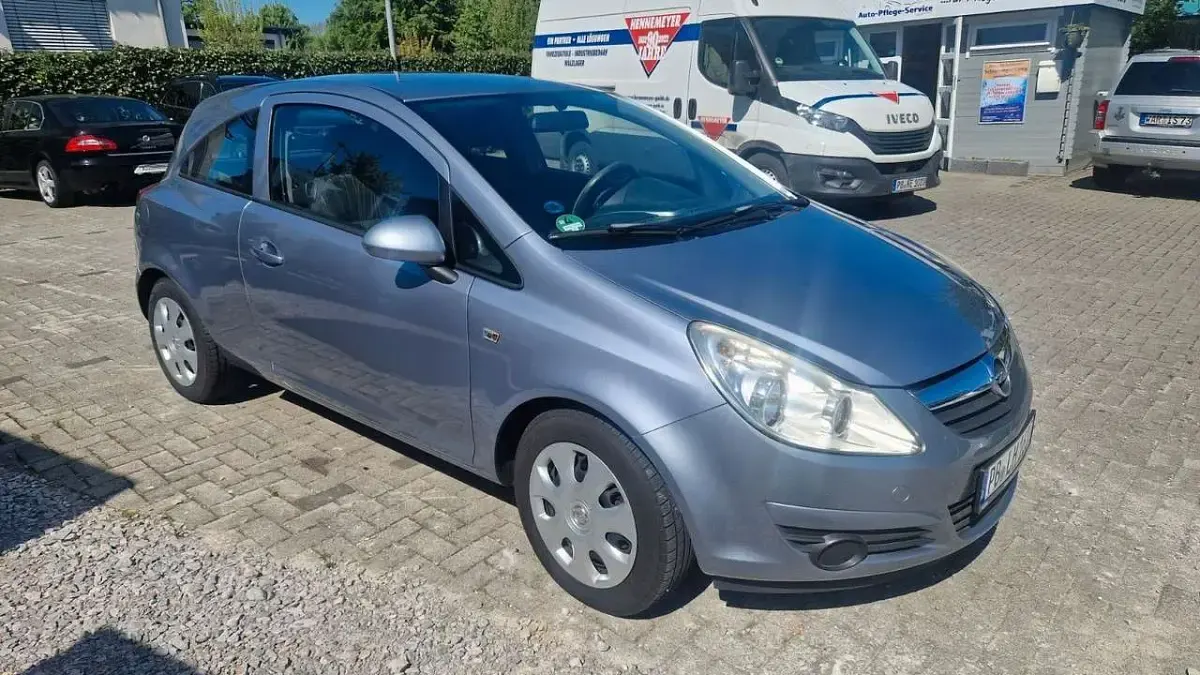 Używany Opel Corsa Edition 80 KM (58 kW) 2009 Srebrny Hatchback