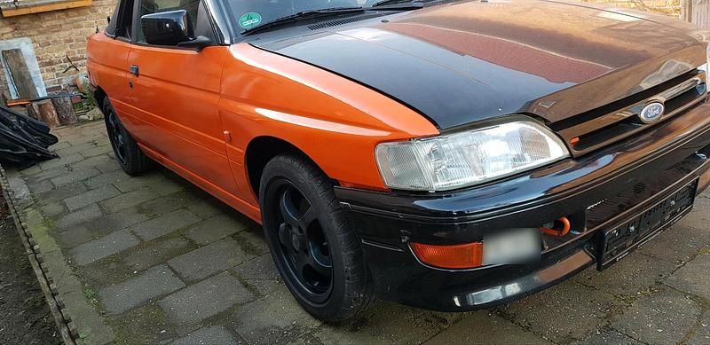 Gebraucht Ford Escort Cabriolet 131 PS (96 kW) 1991 Orange Cabrio