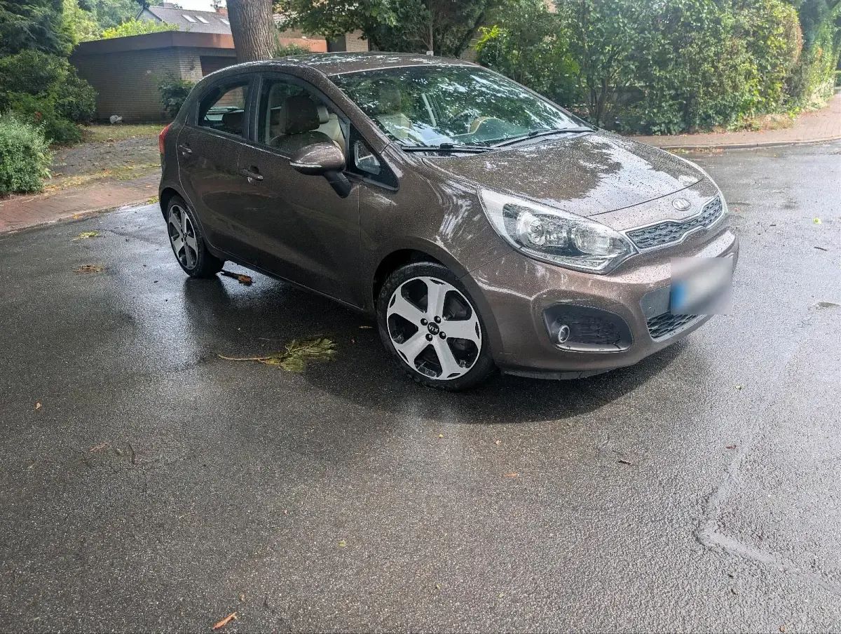 Gebraucht Kia Rio 110 PS (80 kW) 2013 Braun Kleinwagen