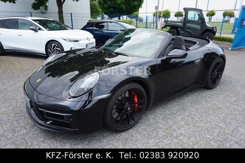 Tiefschwarzmetallic Gebraucht 2023 Porsche 911 Carrera GTS Cabrio | 179.800 € (Teuer) - Bild 1/4