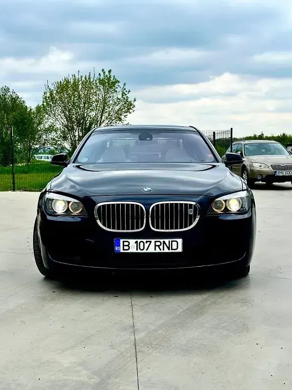 Second-hand BMW 750 Performance 408 CP (300 kW) 2011 Albastru Berlinǎ