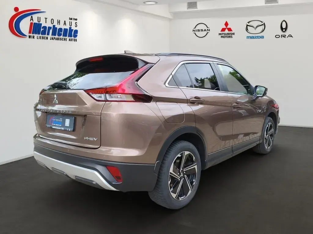 Gebraucht Mitsubishi Eclipse Cross Plus 188 PS (138 kW) 2021 Bronzebraun metallic SUV