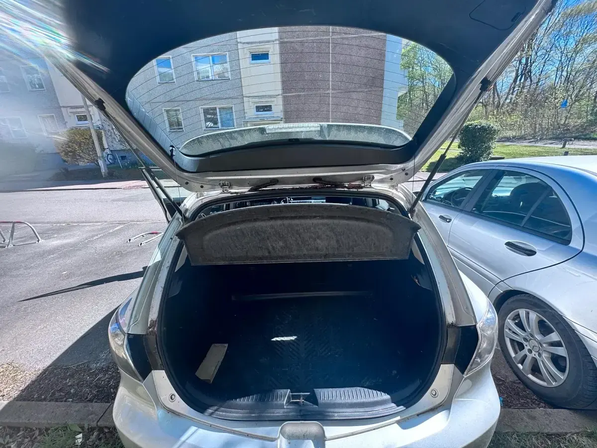 Używany Mazda 3 105 KM (77 kW) 2009 Srebrny Sedan/Limuzyna