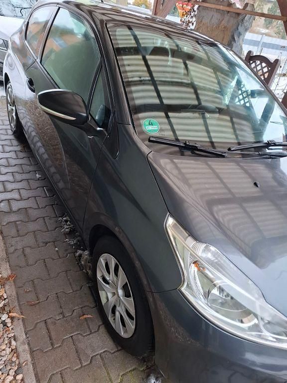 Gebraucht Peugeot 208 Active 68 PS (50 kW) 2013 Grau Kleinwagen