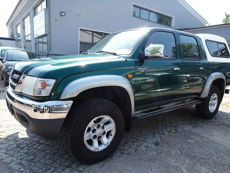 Grün Gebraucht 2003 Toyota HiLux Abholung | 7.900 € (Fairer Preis) - Bild 1/4