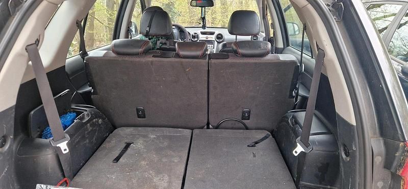 Gebraucht Kia Carens 140 PS (102 kW) 2009 Schwarz Van / Kleinbus