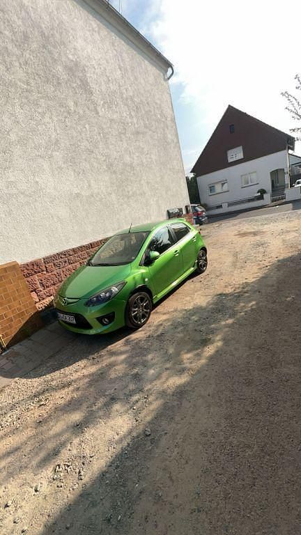 Gebraucht Mazda 2 103 PS (75 kW) 2009 Grün Kleinwagen