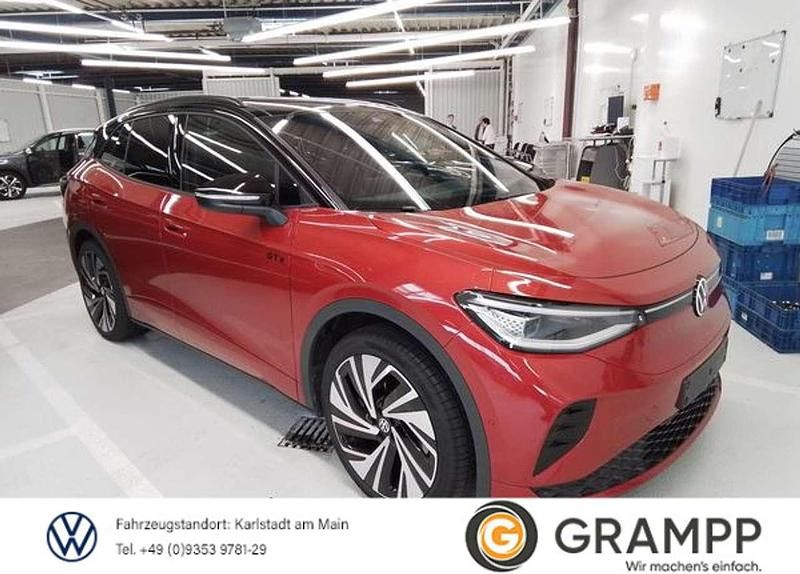 Kings red metallic Gebraucht 2024 VW ID.4 GTX SUV | 44.490 € (Superpreis) - Bild 1/3