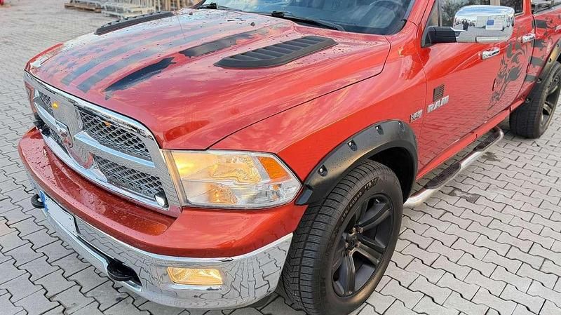 Gebraucht Dodge Ram 396 PS (291 kW) 2009 Orange/rot metallic Pickup