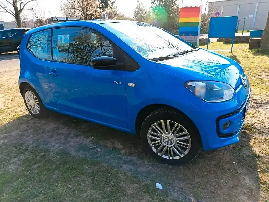 Używany VW up! Cup 60 KM (44 kW) 2014 Niebieski Hatchback