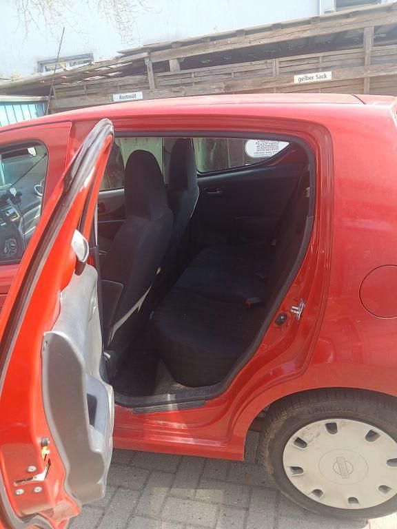 Gebraucht Nissan Pixo Acenta 68 PS (50 kW) 2009 Rot Kleinwagen