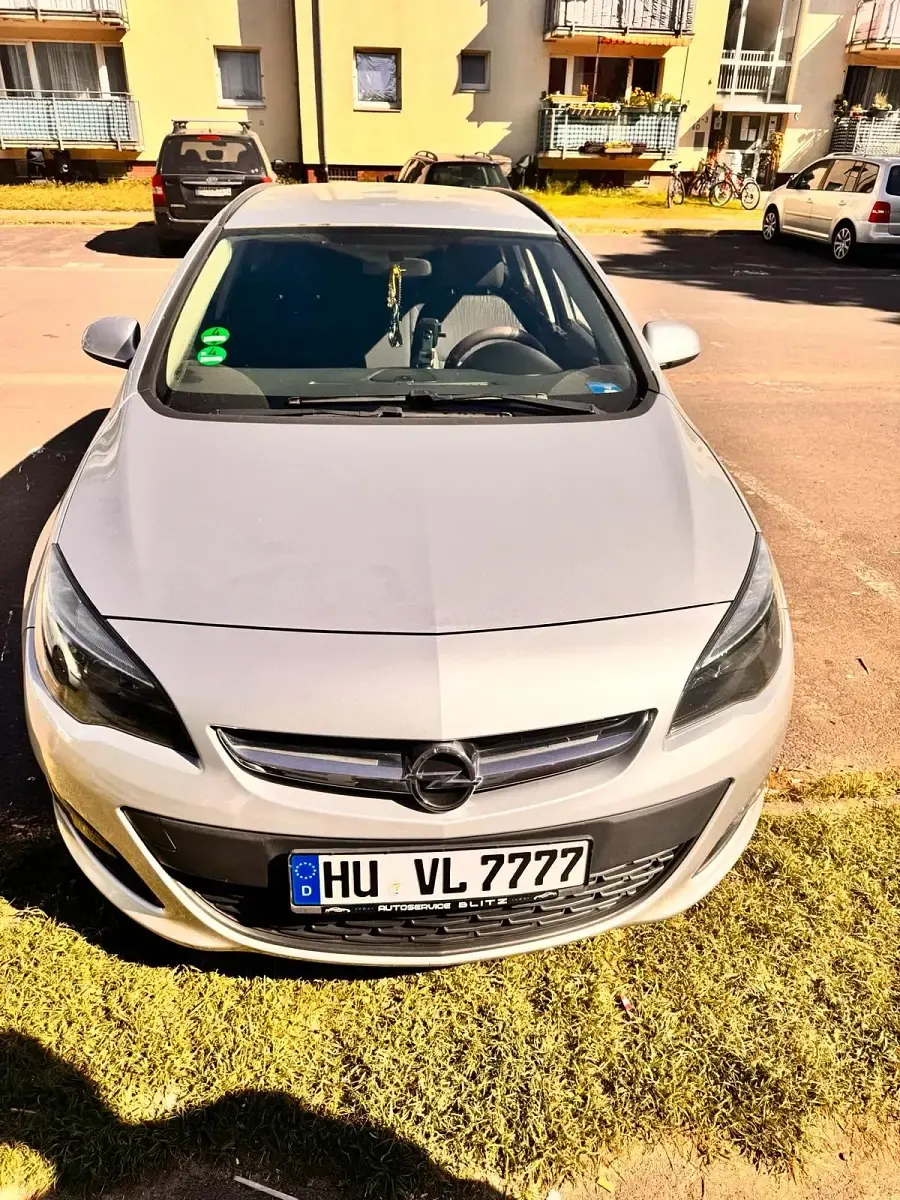 Second-hand Opel Astra 110 CP (80 kW) 2014 Gri Break