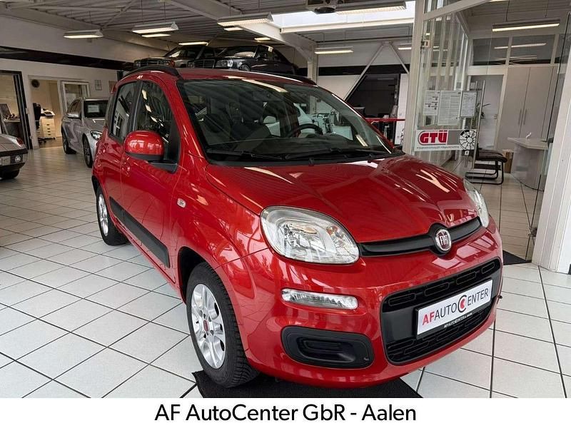Rosso geranio/gioioso Gebraucht 2015 Fiat Panda Lounge Kleinwagen | 9.290 € (Fairer Preis) - Bild 1/4
