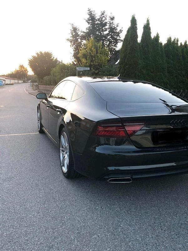 Schwarz Gebraucht 2015 Audi A7 Design Kleinwagen | 21.900 € (Teuer) - Bild 1/4