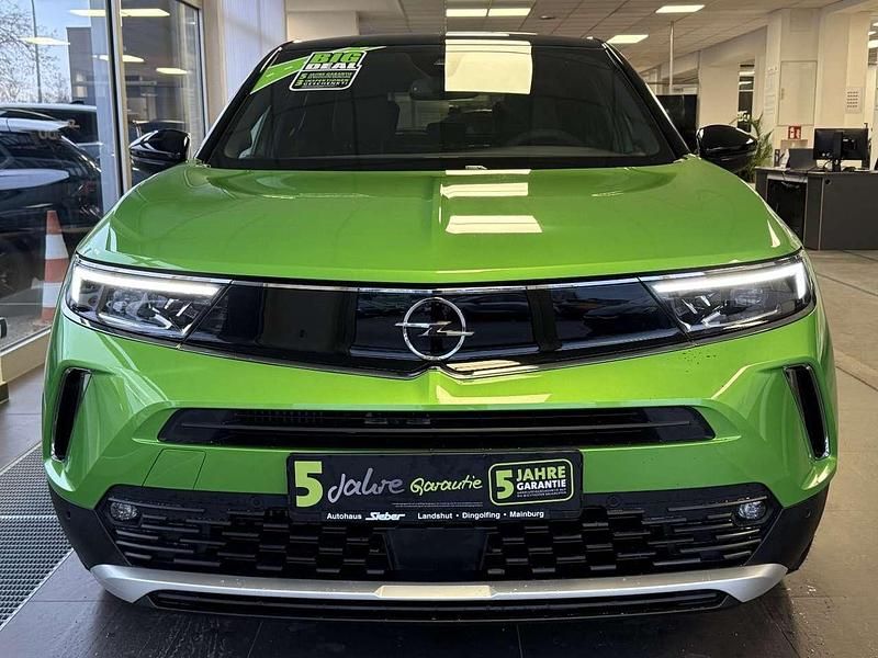Gebraucht Opel Mokka Ultimate 131 PS (96 kW) 2023 Matcha green metallic SUV
