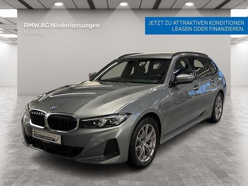 Grau Gebraucht 2022 BMW 320e Sport Line Kombi | 35.690 € (Teuer) - Bild 1/4