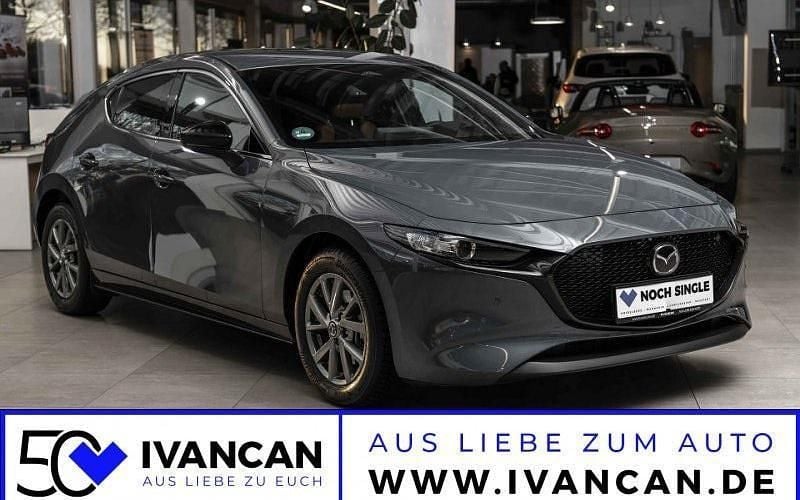 Grau Gebraucht 2024 Mazda 3 Nagisa Limousine | 28.450 € (Superpreis) - Bild 1/4