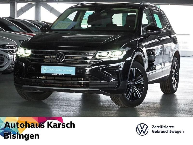 Deep black perleffekt (metallic) Gebraucht 2021 VW Tiguan Elegance SUV | 26.890 € (Superpreis) - Bild 1/3