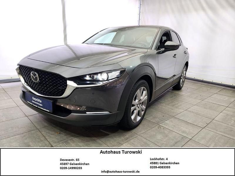 Machine gray (metallic) Gebraucht 2020 Mazda CX-30 Selection SUV | 21.970 € (Fairer Preis) - Bild 1/4