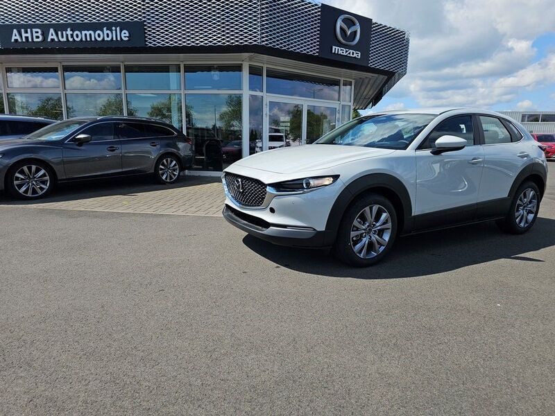 Ceramic white Gebraucht 2024 Mazda CX-30 Exclusive-Line SUV | 27.210 € (Fairer Preis) - Bild 1/4