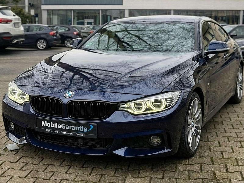 Tansanitblau metallic Gebraucht 2016 BMW 420 M Sport Coupé | 20.890 € (Fairer Preis) - Bild 1/4