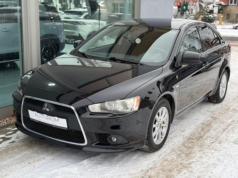Pantherschwarz (p) Gebraucht 2011 Mitsubishi Lancer Sportback Edition Limousine | 4.699 € (Fairer Preis) - Bild 1/4