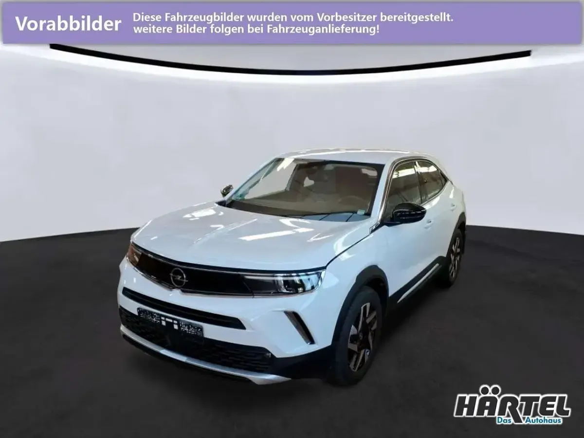 Gebraucht Opel Mokka-e Elegance 100 kW (136 PS) 2022 Jade weiß (white), metallic SUV