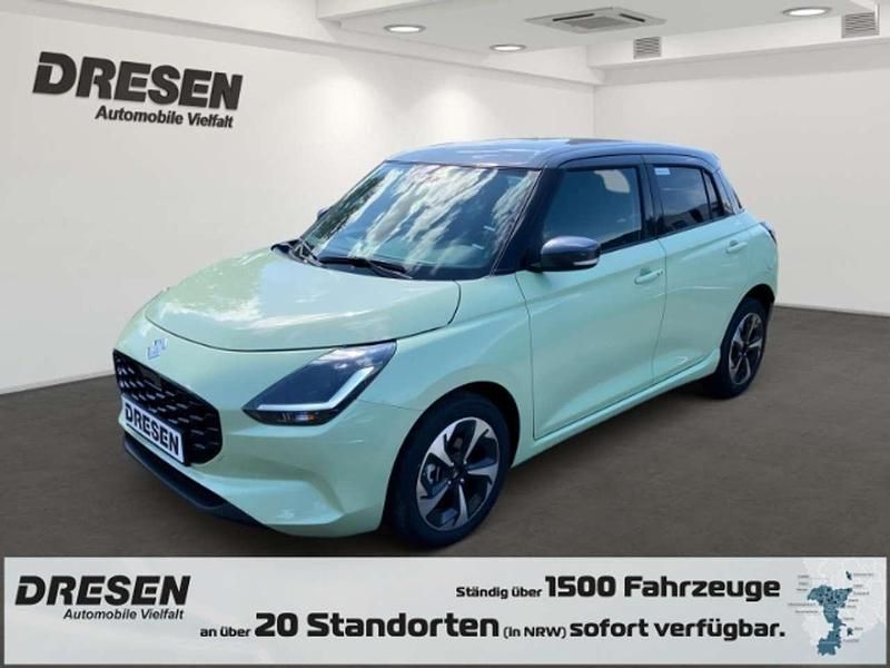 Cool yellow metallic / mineral Neu 2025 Suzuki Swift Comfort+ Kleinwagen | 20.490 € - Bild 1/4
