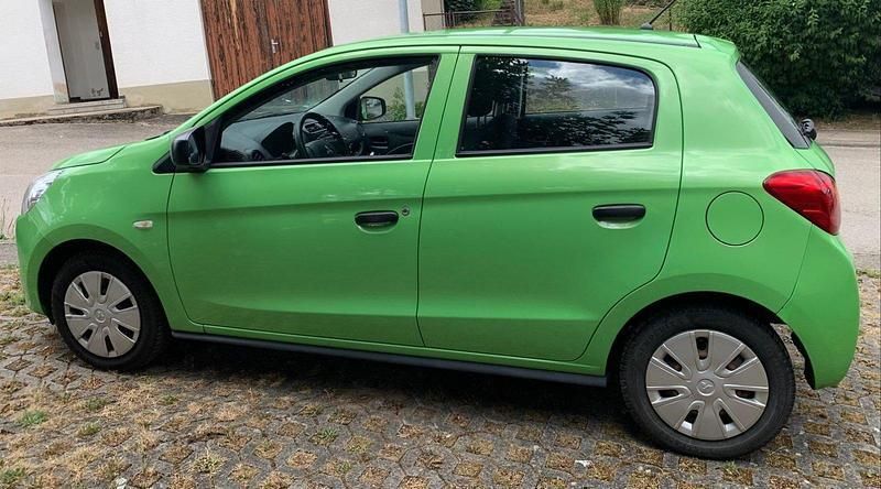 Grün Gebraucht 2015 Mitsubishi Space Star Classic Collection Kleinwagen | 3.900 € (Guter Preis) - Bild 1/4