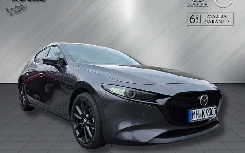 Grau Gebraucht 2024 Mazda 3 Exclusive Limousine | 27.290 € (Guter Preis) - Bild 1/4