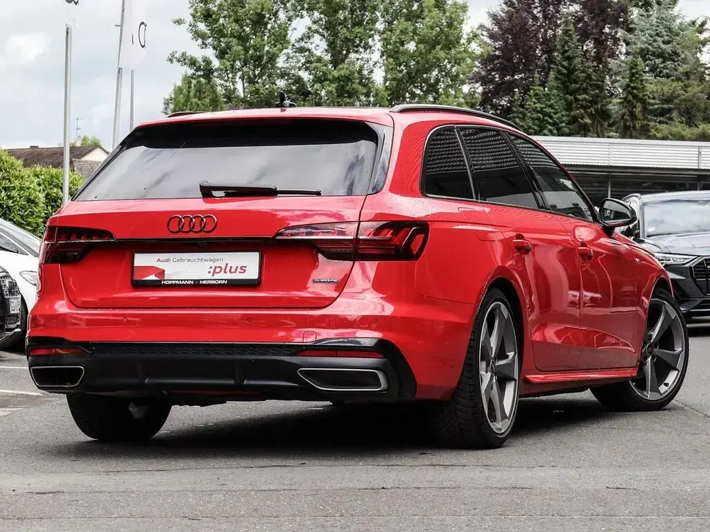 Gebraucht Audi A4 S-Line 204 PS (150 kW) 2023 Tangorot metallic Kombi