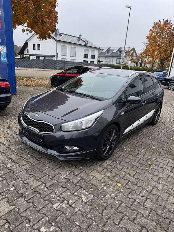 Grau Gebraucht 2014 Kia Ceed Sportswagon 2 Kombi | 7.400 € (Fairer Preis) - Bild 1/4