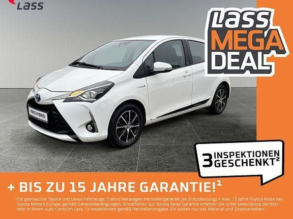 Schneeweiß Gebraucht 2018 Toyota Yaris Hybrid Basis Limousine | 13.980 € (Fairer Preis) - Bild 1/4